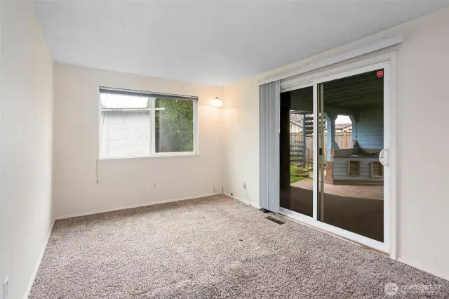 Primary bedroom with Slider to covered patio