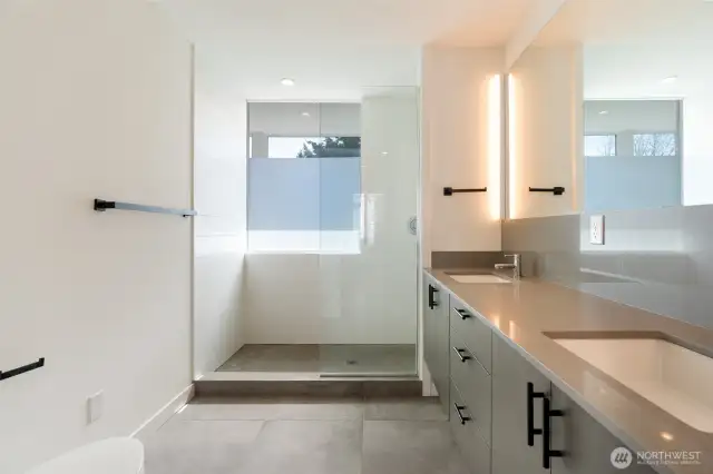 Full ensuite with double sinks and walk in shower