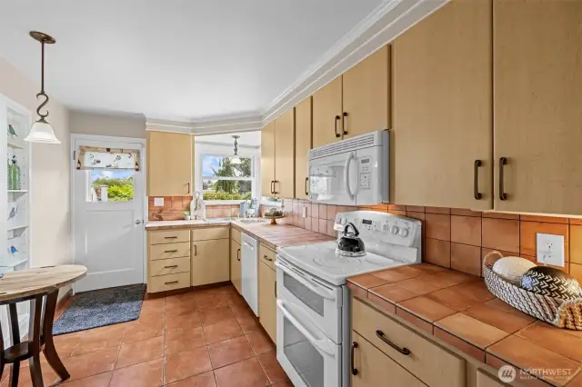quality cabinets, back door leads to your patio
