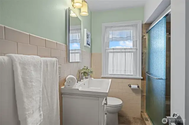 Updated main bath,gorgeous tiled walk in shower. ADA compliant