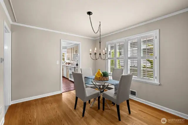 Spacious dining room leads to kitchen