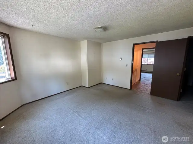 One of two large upstairs bedrooms