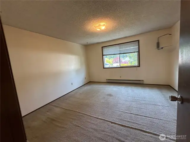 One of two large upstairs bedrooms