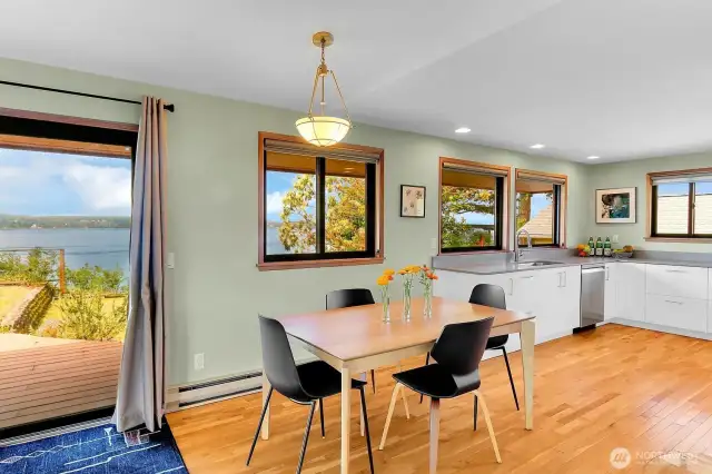 The generous dining area is between the kitchen and living room.