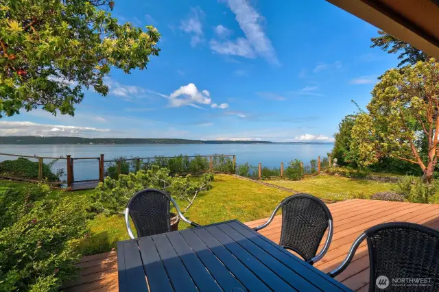 Outdoor dining among the Madronas and view, complete with a privacy fence!