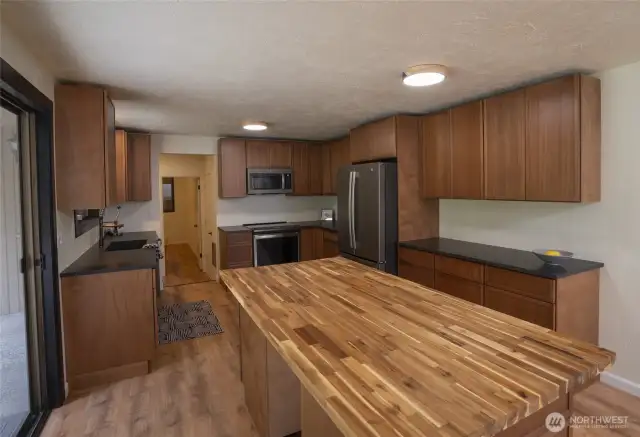 Butcher block island in kitchen