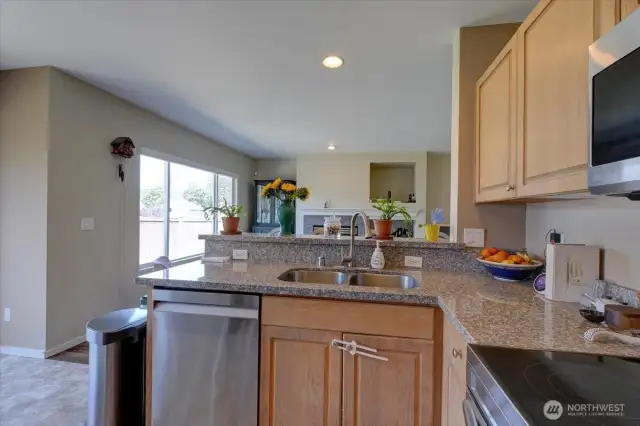 View into the family room over the eating bar.
