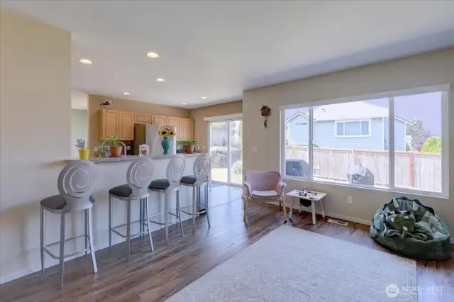 From the family room towards the kitchen and eating bar.