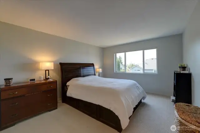Primary bedroom has views of the Olympic Mountains.