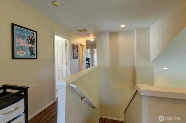 Looking down the hall towards the other bedrooms.