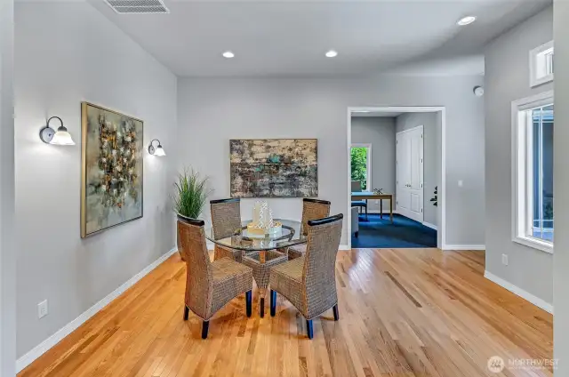 Off the entry is the dining area with the office/den straight ahead and second bedroom suite to the right.