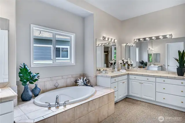 Separate vanities, lots of counter space, a soaking tub . . .