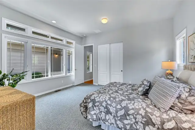 This bedroom enjoys courtyard views.