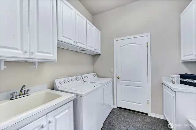 The washer and dryer are included with the home. Handy laundry sink and lots of storage.