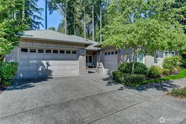 This home has a two car garage that enters directly into the home and a third bay with an exterior entrance.