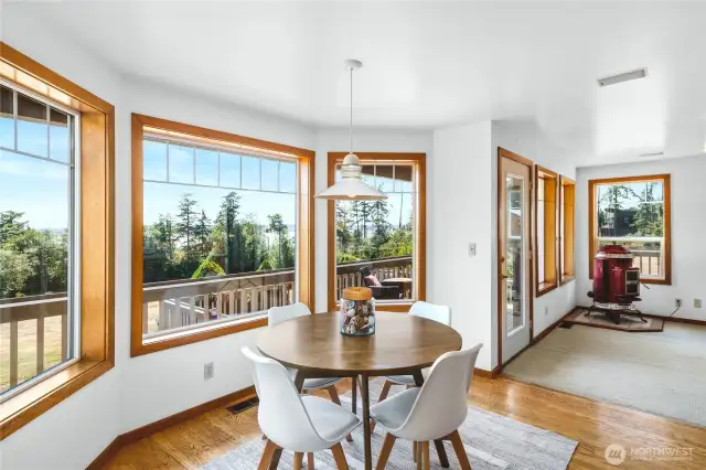 Eat-in kitchen area is perfect breakfast nook with views to the water.