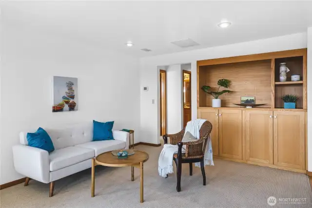 Family room with built in cabinetry.