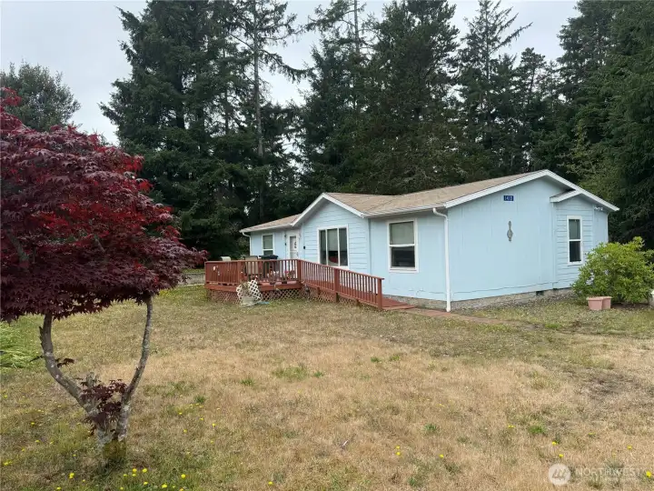 Two bedroom with bonus room and two baths on a nice sized lot.