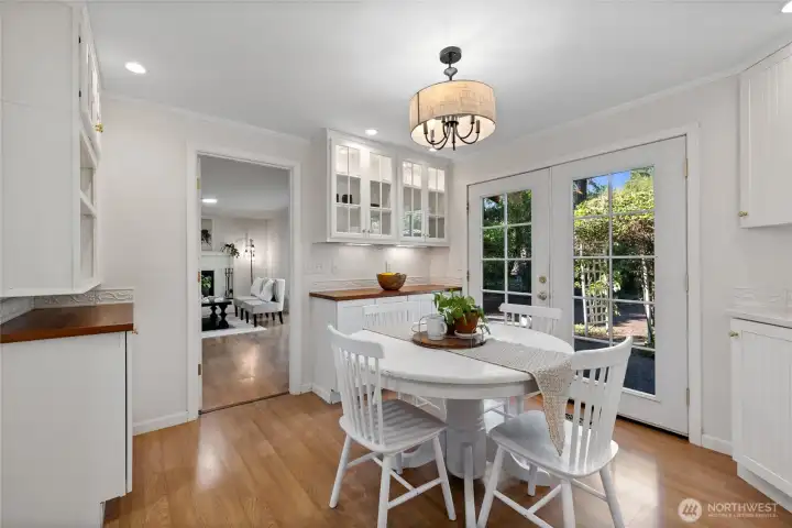 Eating space in kitchen with french doors to back patio.