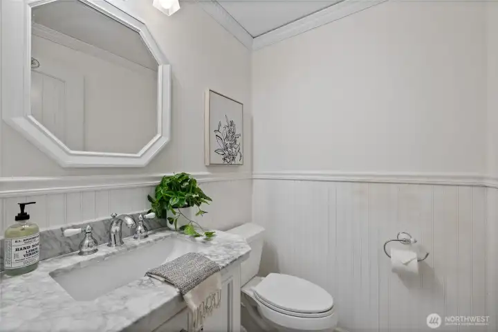 Half bath on main floor, near entry.