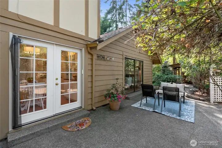 French doors from kitchen lead to back patio.
