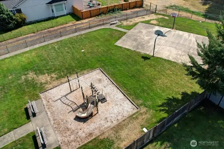 Basketball court and playground within walking distance