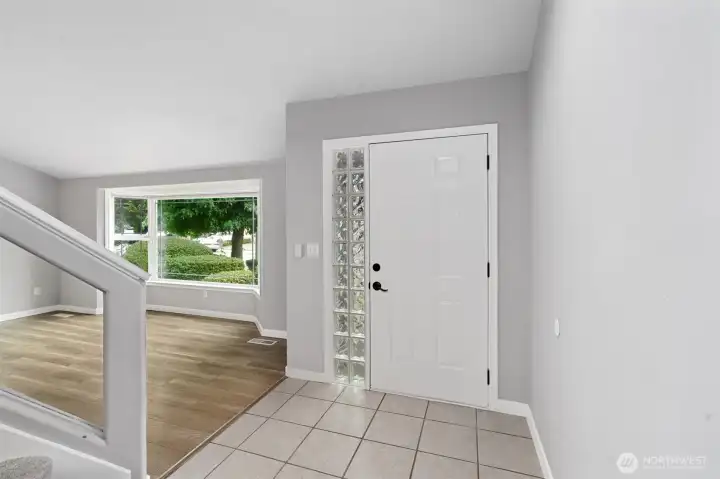 View of the front door and entryway.