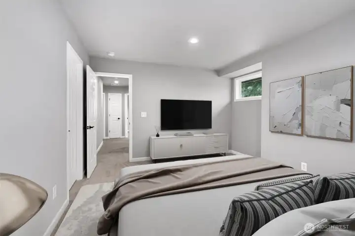 Gigantic primary bedroom, with a huge walk-in closet.