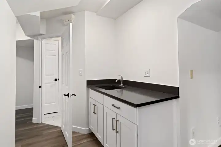 Daylight basement already has a sink - rental potential anyone?