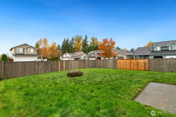 Large fully-fenced backyard.