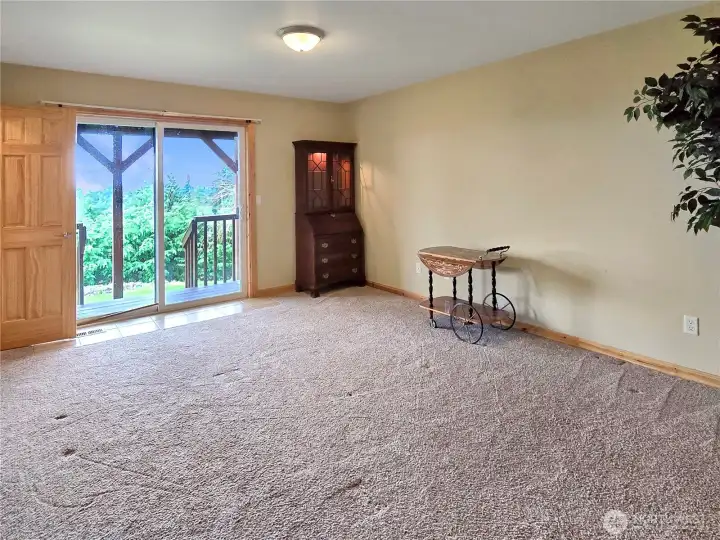 Lower: Bedroom with private deck.