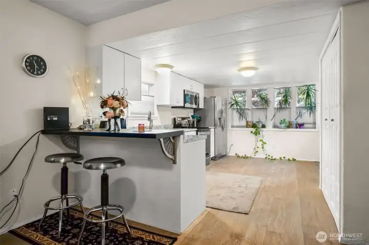 A spacious updated kitchen with potential  room to add a small table or island.