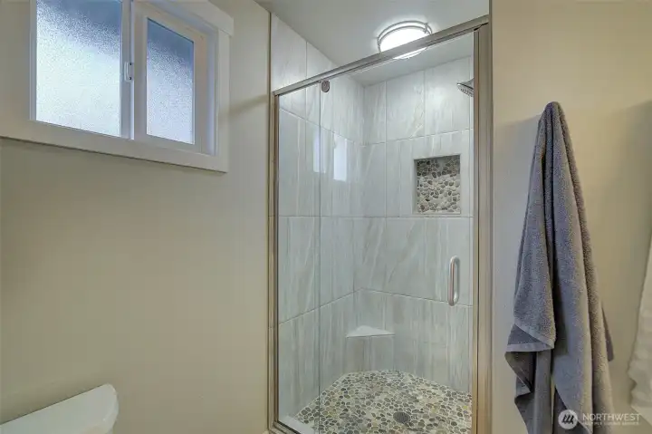 Primary bathroom shower.