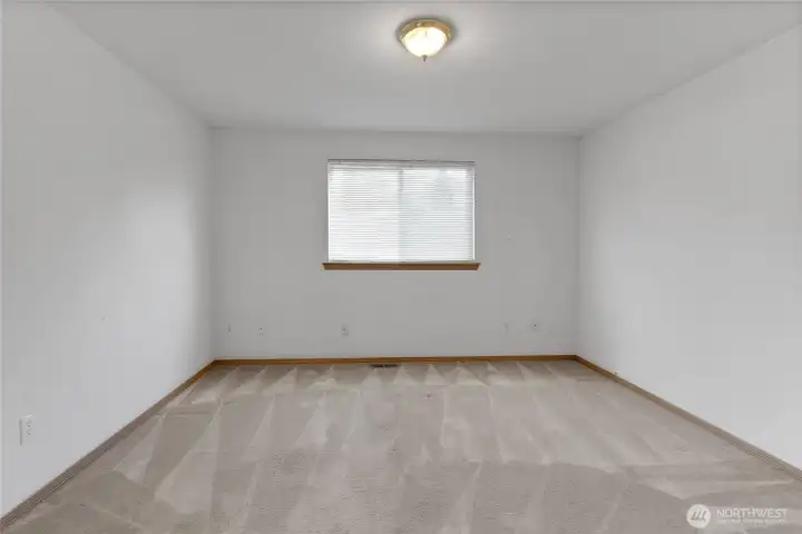 Primary Bedroom view from Entry Door in front Hallway off Living Room