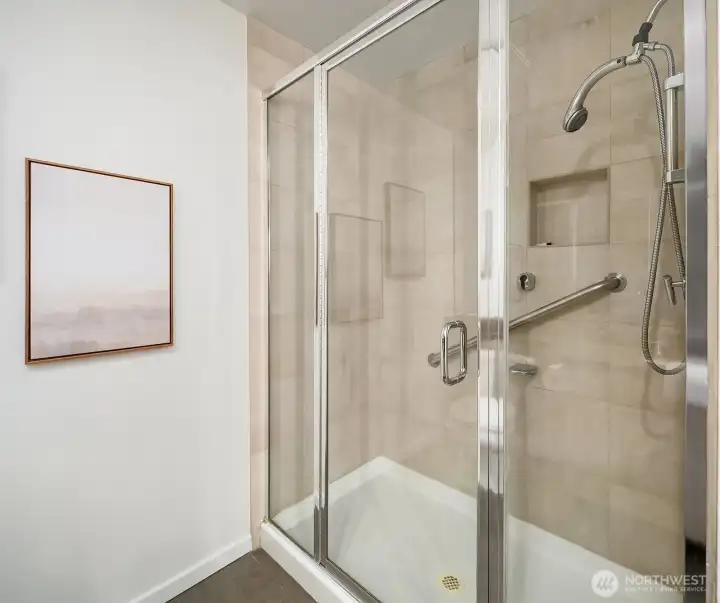 Spacious walk-in shower in the primary bath.