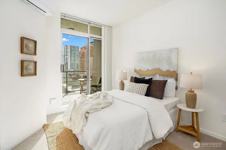 2nd bedroom with private access to the sunny balcony.