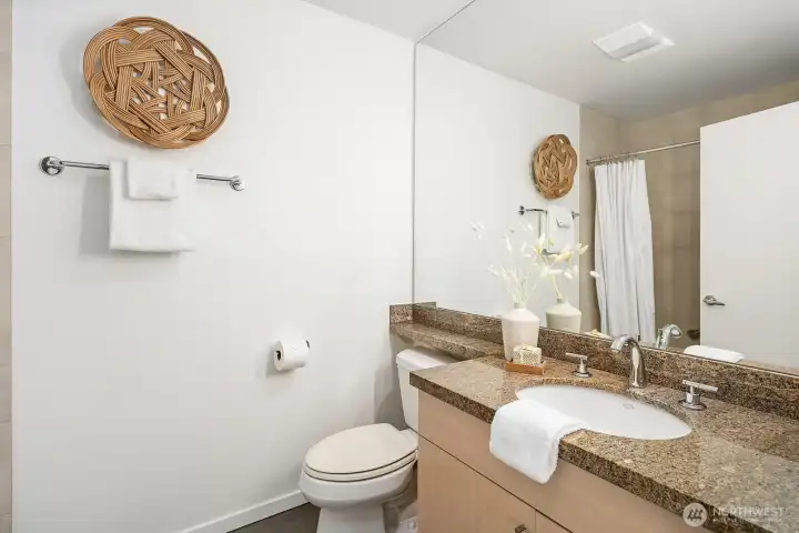 Full guest bath off the hallway.