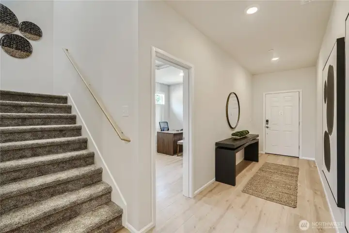 Entry and office/Den   Photos are representation as the home is under construction.