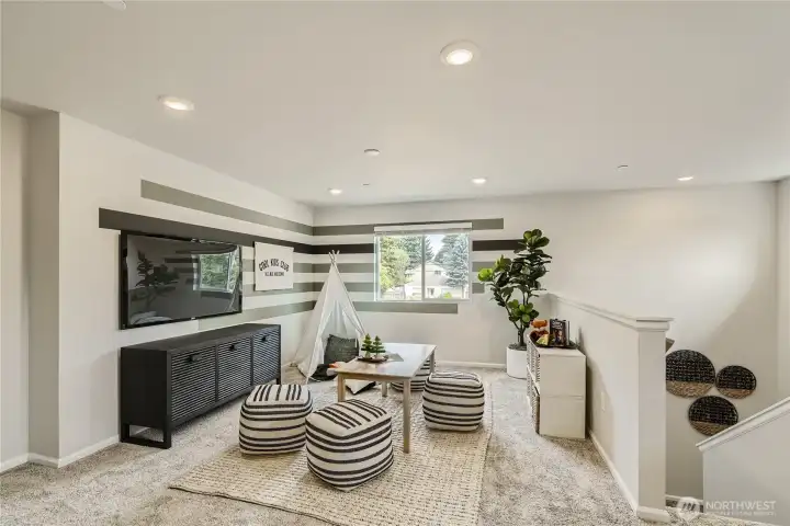 Loft at the top of the second floor.  Photos are representation as the home is under construction.