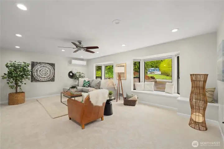 Large living room with huge windows to allow all the natural light in!