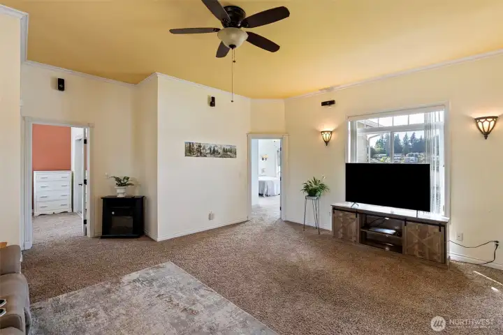 Bonus room at the top of the stairs which is being used as the media room. Surround sound equipment is stored here behind the sofa, surround sound is wired fully throughout the house.