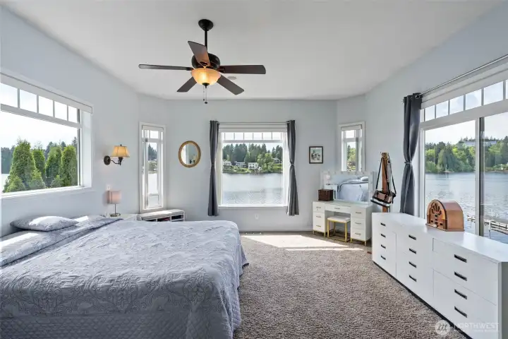 Extensive primary bedroom gives majestic views of the lake and mountain. The sound of the water lapping the shoreline with the ducks softly in the background is heavenly.