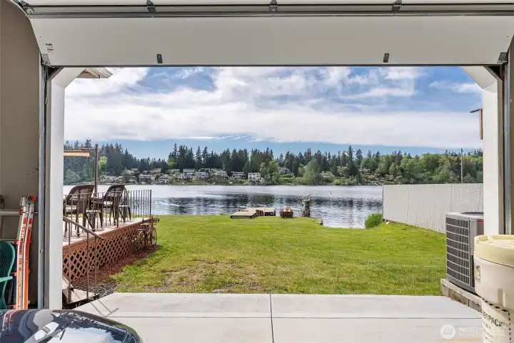 Garage with drive through to the lake. Bonus room is above.