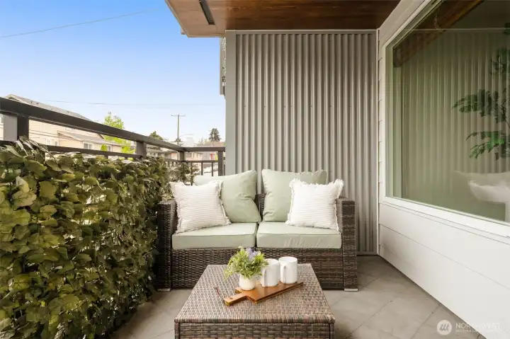 Private balcony. Privacy screen stays with home.