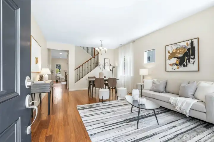 Flowing open layout with bamboo flooring.