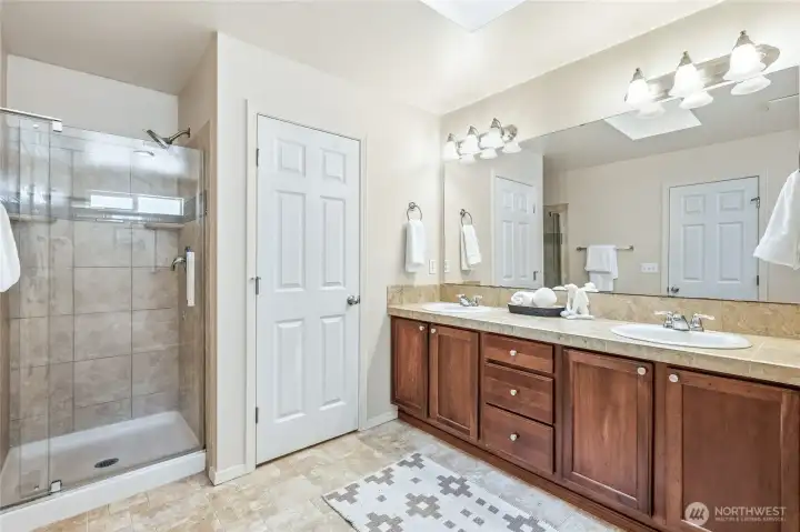 Primary bath with dual vanities, separate shower...