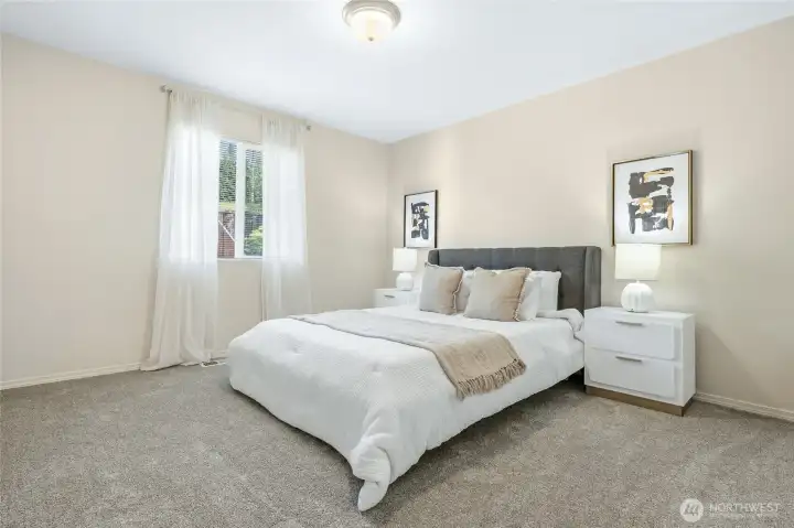 One of three secondary bedrooms on the upper floor.