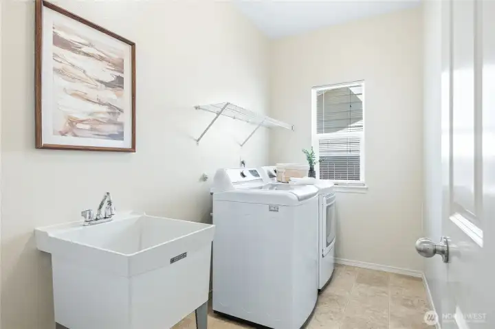 Convenient sink in the laundry room.