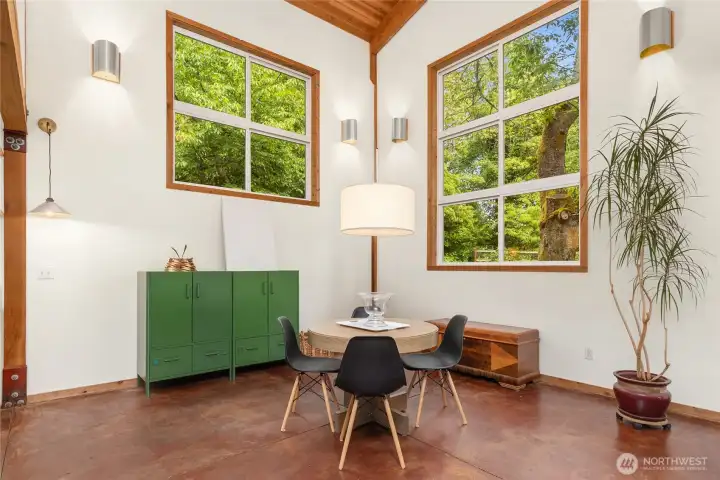 Vaulted ceilings on main floor look out to Cherry Tree and green belt. Vaulted ceilings on main floor look out to Cherry Tree and green belt.
