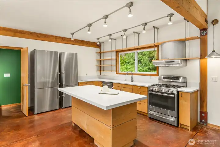 Half bath off kitchen, island. Half bath off kitchen, island.